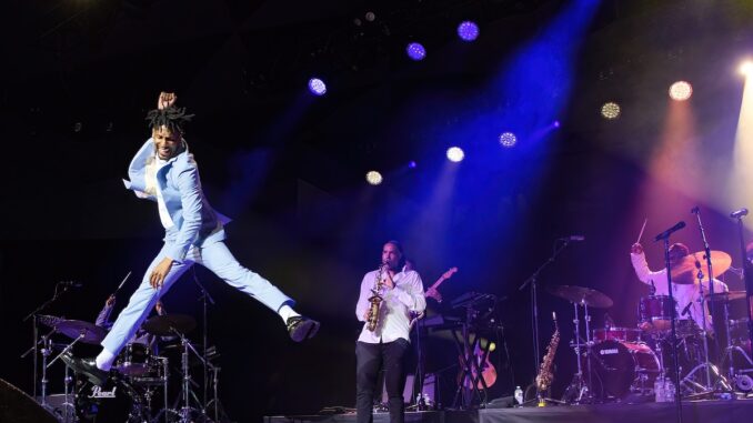 JUMP lead photo Jon Batiste jumps onstage at Tanglewood (Hilary Scott)